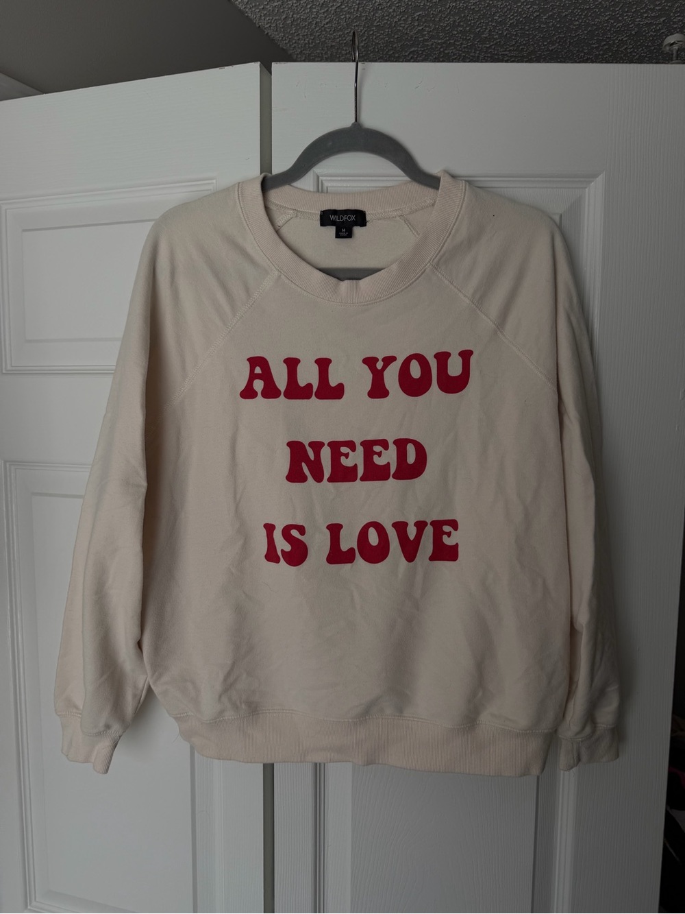 Wildfox Cream Sweatshirt with Red Graphic "ALL YOU NEED IS LOVE"